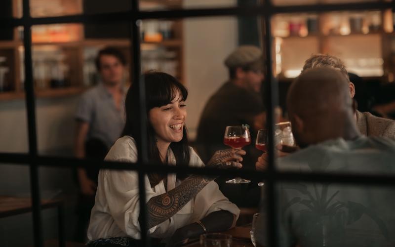 a person holding a glass of wine